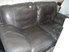 A black leather 2 seat sofa.