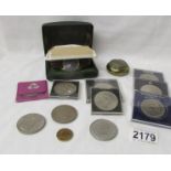 A mixed lot of coins and boxed Mondaine watch.