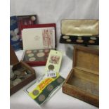 A mixed lot of coins including box of old pennies, proof sets, foreign coins etc.