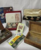 A mixed lot of coins including box of old pennies, proof sets, foreign coins etc.