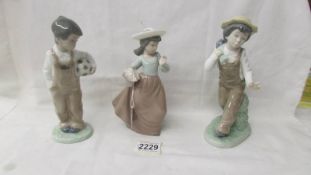 4 NAO figurines - A boy with a football, a boy with a dog and a girl with a flower basket.