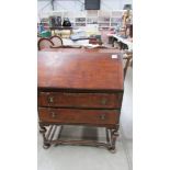 A 1930/50's mahogany veneered bureau, 75 x 41 x 100 cm high.