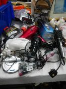 A mixed lot including hair dryer, radio, head phones etc.