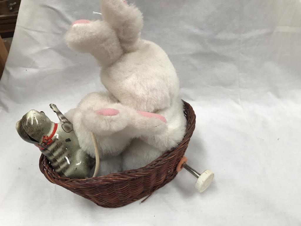 A tin plate clockwork cat & a late 20th century rabbits in basket - Image 3 of 5