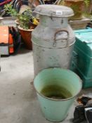 An old milk churn and an enamel bucket.