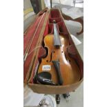 An old violin in leather case, a/f.