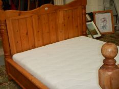 A good quality 5ft pine bedstead complete with slats and mattress.