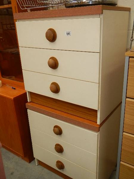A pair of 3 drawer bedside chests.