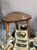 A 1970's retro tripod teak effect side table