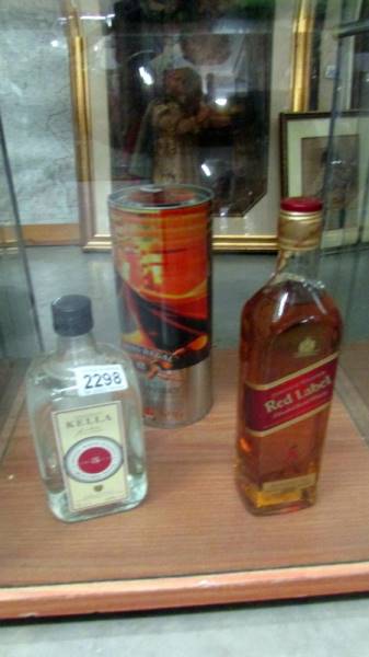 Three bottles of whisky - Johnnie Walker red label,