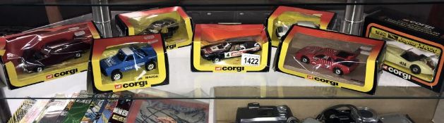 A collection of 7 boxed Corgi Die cast cars