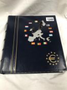 An album of Euro coins from various countries