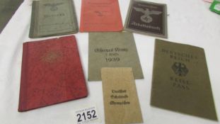 Five Nazi era pass books including Reise Pass, Postperbuch, Arbeitsbuch,