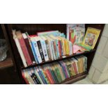 Two shelves of children's books.