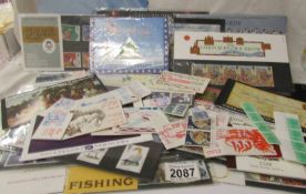 A collection of Royal Mail presentation packs, mint stamp sets,