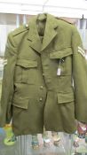 A circa 1960's military suit No. 2 dress uniform jacket and trousers, size 32.