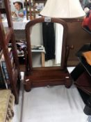 A Victorian mahogany toilet dressing mirror with drawer