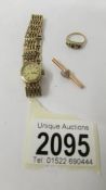 A 9ct gold ladies Rotary wrist watch and 2 other gold items, 21.5 grams in total.