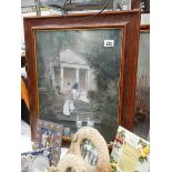 A framed and glazed print of people on steps of large house by water.