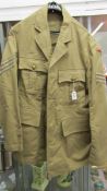 A circa 1950's military khaki drill jacket, A.A 1949 pattern, size 14.