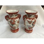 A pair of 19th century Japanese Kutani hand painted vases