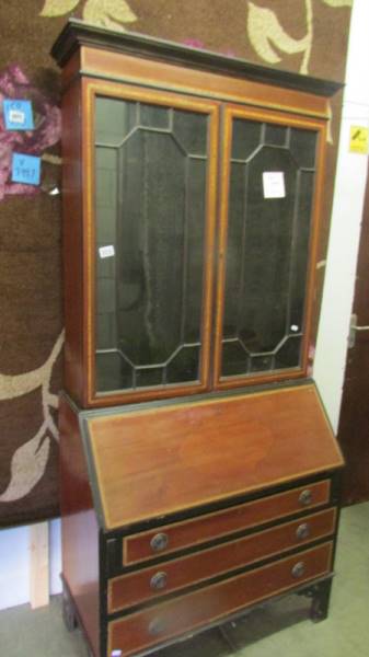 A mahogany inlaid bureau book case (no key).