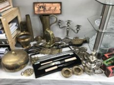 A good selection of brassware including Trench art shell case jug,