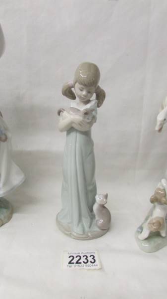 Three Lladro figures - Girl with goose and dog, girl with kittens and girl with bird. - Image 3 of 4