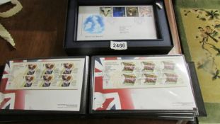 A Paralympic games 2012 album of first day covers and a quantity of 2000-2001 first day covers.