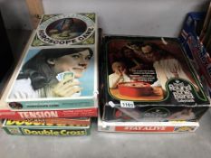 A quantity of vintage board games including Madame Planchette horoscope game etc.