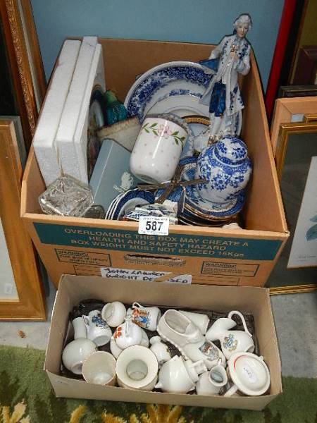 Two boxes of crested ware, Wedgwood, blue and white etc.