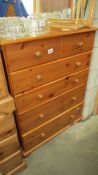 A solid pine 6 drawer chest. 83 x 38 x 107 cm.