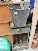 An old paraffin heater, bucket etc.