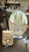 A vintage wall plaque of Lincoln Cathedral and exchequergate by Roy Fisk and another of The Glory