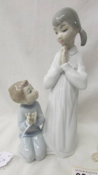 Two Lladro figurines - boy and girl praying and and angel. - Image 3 of 3