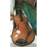 A cased violin, a/f. ****Condition report**** Size; 14.