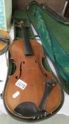 A cased violin, a/f. ****Condition report**** Size; 14.
