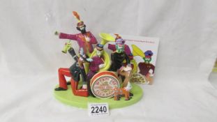 A Coalport Sgt Peppers Lonely Hearts Club Band with certificate, 265/1000. (trombone loose).