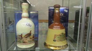 2 boxed Wade decanters - Extra Old Special 50yrs and Extra Old Special 75yrs,