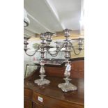 A good pair of silver plate candelabra.