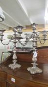 A good pair of silver plate candelabra.