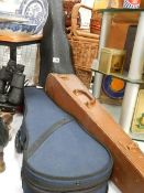 Three old violin cases.