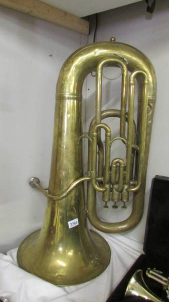 A brass E flat bass.