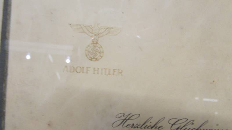 A framed and glazed Adolf Hitler Christmas card to General Oberst Eduard Dietl, - Image 2 of 5
