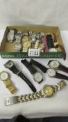 A mixed lot of ladies and gent's wrist watches.