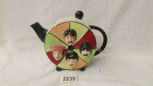 A Lorna Bailey Beatles face teapot (lid a/f).