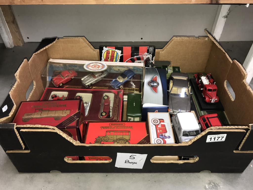 A quantity of assorted collectables special additions including dinky sports car on plinth (3 cars)