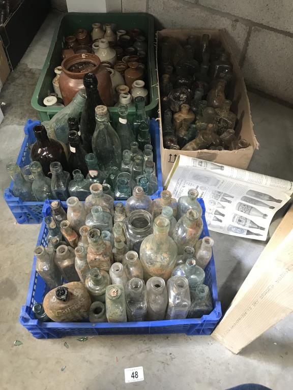 3 boxes of bottles 7 a box of stoneware jugs