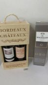 A boxed Macallan fine oak triple cash matured 10 year old whisky and 2 bottles of Chateau Bordeau.