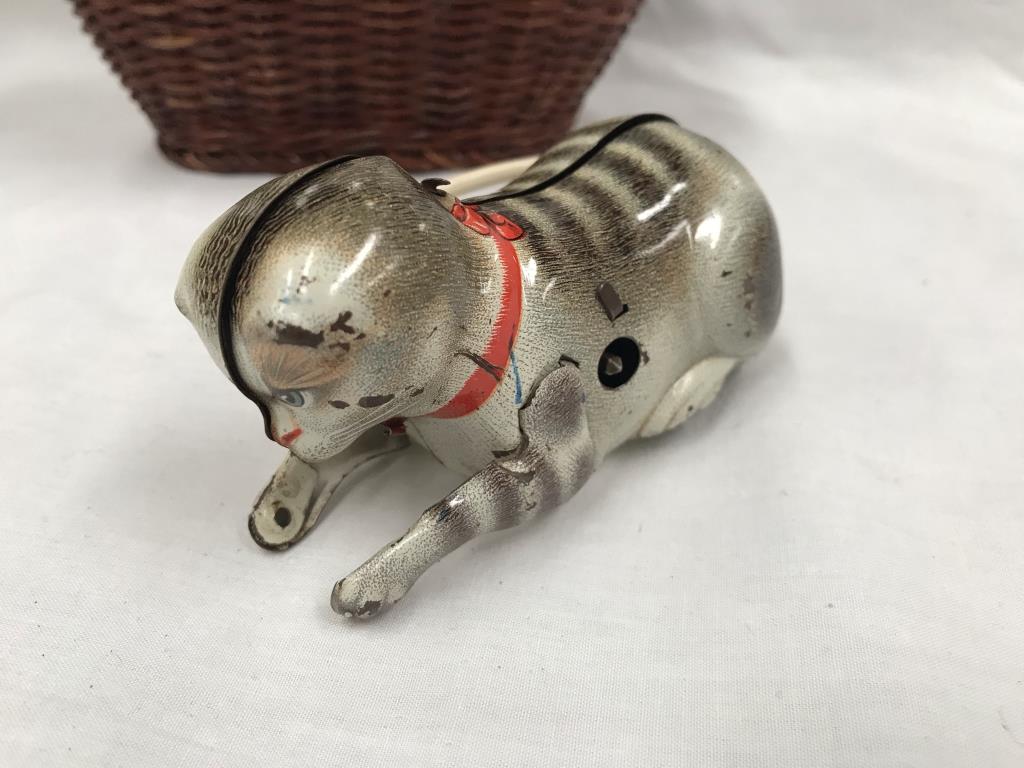 A tin plate clockwork cat & a late 20th century rabbits in basket - Image 4 of 5